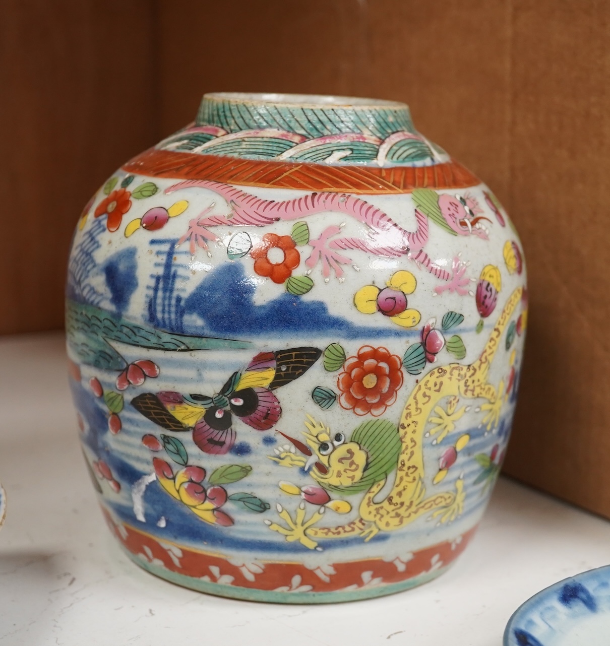 A Chinese famille rose vase, together with a Japanese Imari plate and two others, largest 16cm high. Condition - poor to fair